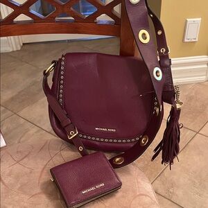 Michael Kors Crossbody Plum Leather Saddle Bag with Tassel Strap & Wallet.